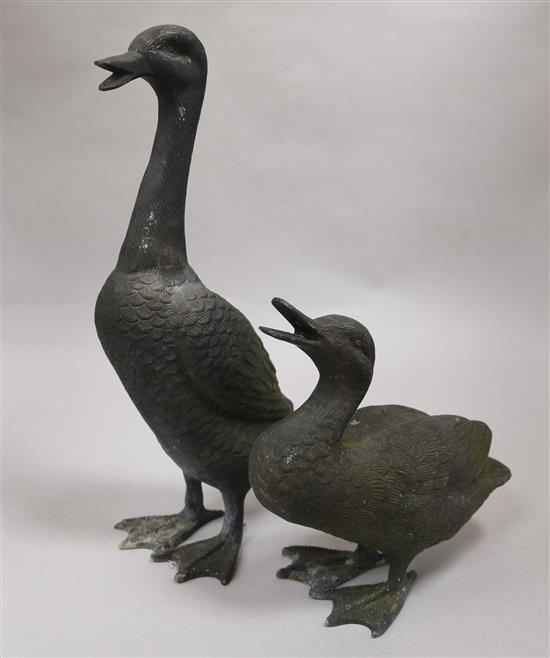 Two bronze geese. Tallest H.35cm.